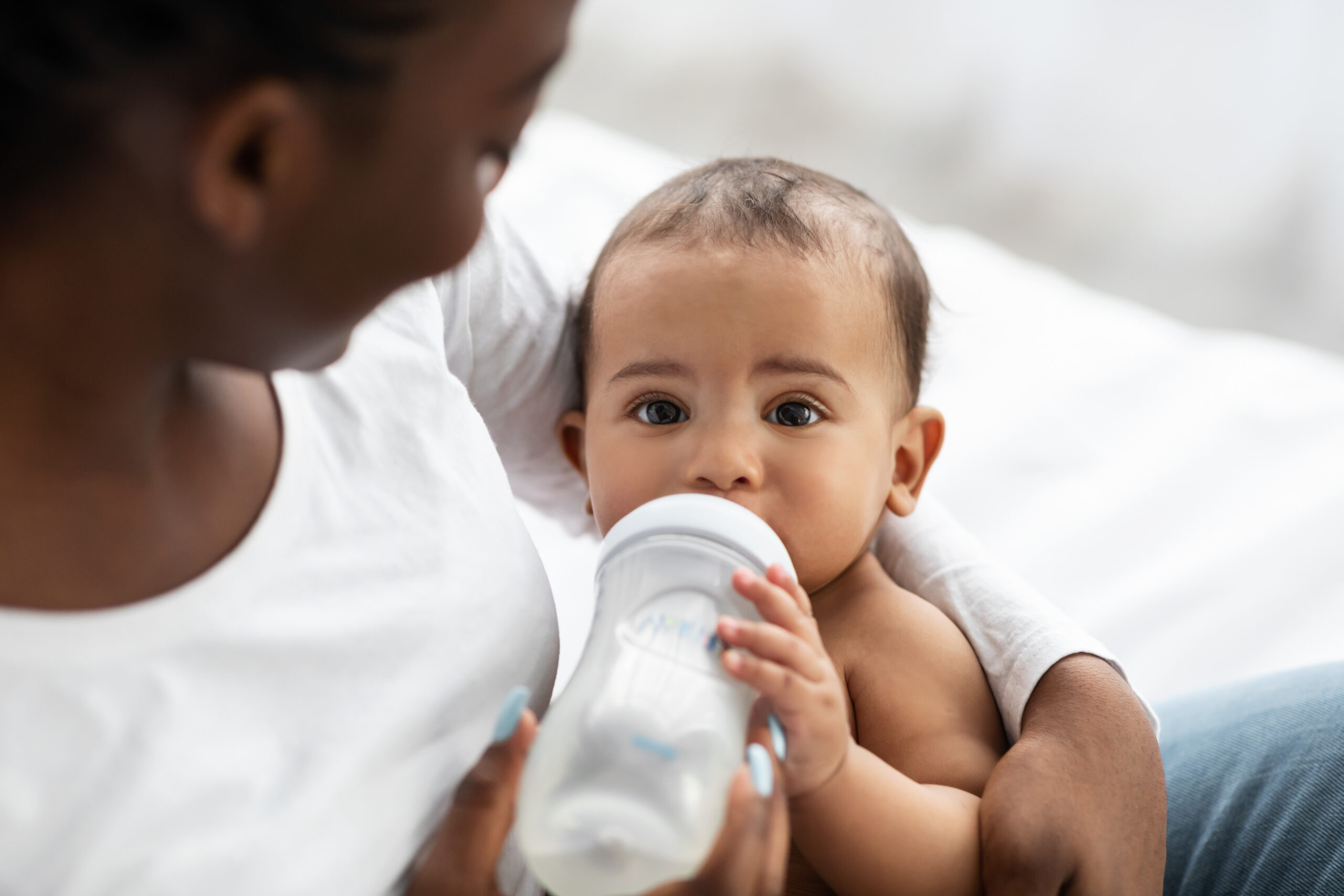 Image of baby feeding from a bottle